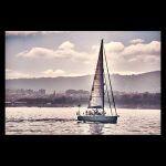 Sailboat in the Vigo estuary at sunset