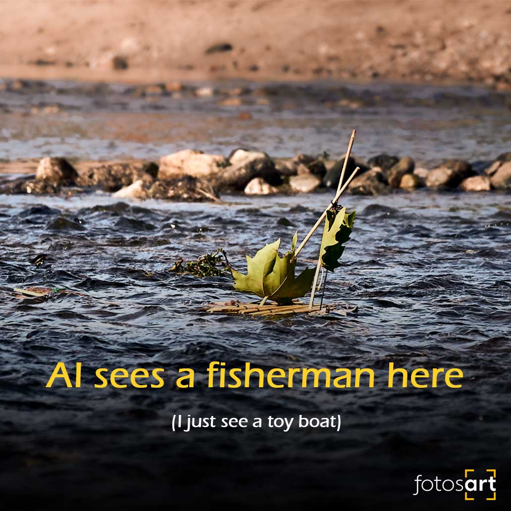Artistic photograph of a leaf raft sailing on a river that artificial intelligence mistakes for a fisherman.